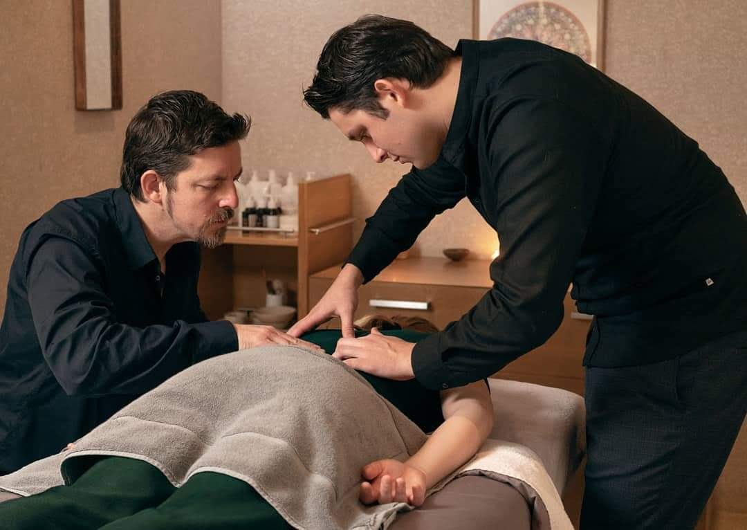 Andy and Duran giving a treatment at Akasha, Hotel Café Royal